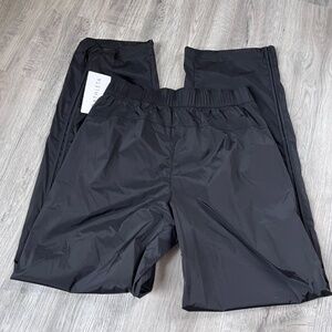 New! ATHLETA Rise Pant Size small tall Black Bungee Hem Zip Pocket Nylon Blend